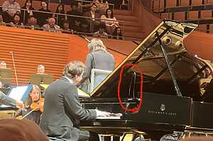 Pianist With Broken String